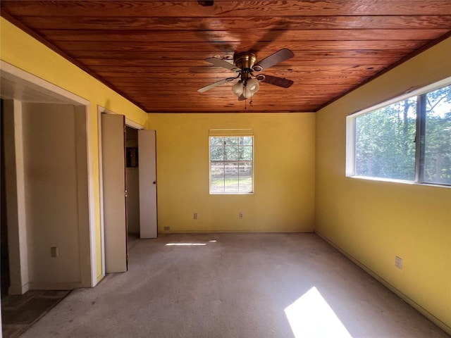 101 Hidden Cove Dr, Point Blank, TX 77364 - spare room featuring wooden ceiling, ceiling fan, and light carpet