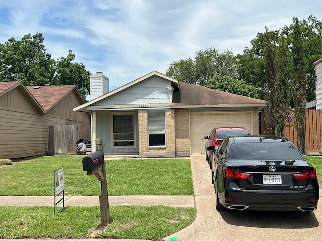6343 Glenhagen Dr, Houston, TX 77084 - view of front facade featuring an attached garage, driveway, a chimney, brick siding, and board and batten siding