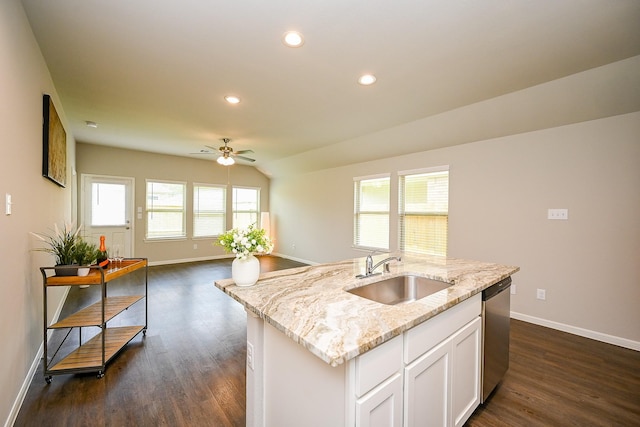 10130 Barn Owl Trl, Magnolia, TX 77354 - kitchen with a sink, dishwasher, baseboards, a ceiling fan, and dark wood-type flooring