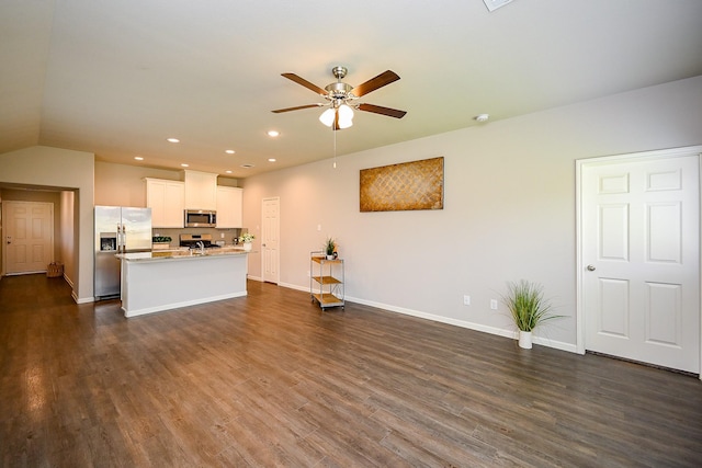 10130 Barn Owl Trl, Magnolia, TX 77354 - unfurnished living room with ceiling fan, dark wood-style flooring, recessed lighting, and baseboards