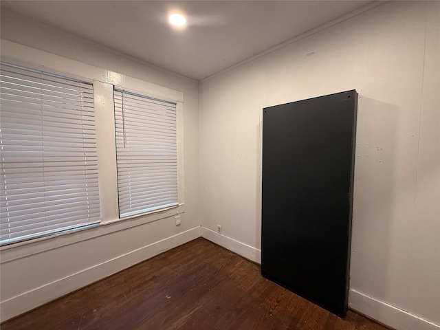 544 W 28th St, Houston, TX 77008 - spare room featuring dark wood finished floors and baseboards