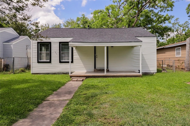 1306 W 6th St, Freeport, TX 77541 - view of front of home featuring a porch and a shingled roof