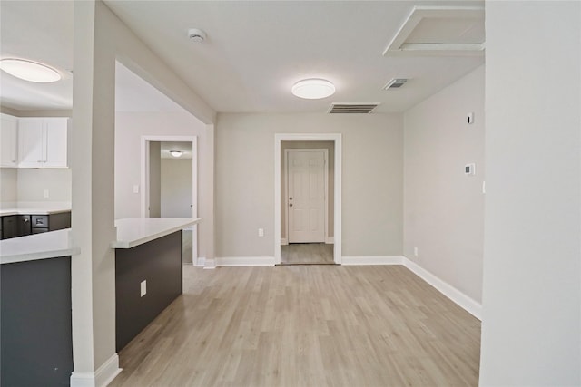1306 W 6th St, Freeport, TX 77541 - unfurnished room with light wood-type flooring, baseboards, and a smoke detector