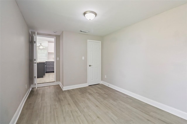 1306 W 6th St, Freeport, TX 77541 - spare room with light wood-type flooring and baseboards