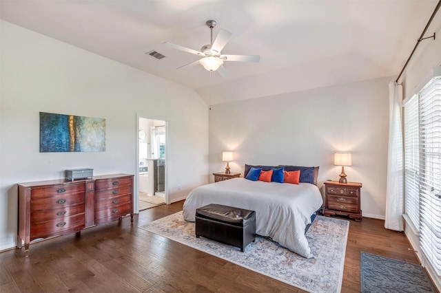 2101 Menard Ave, Seabrook, TX 77586 - bedroom featuring vaulted ceiling, wood finished floors, ensuite bathroom, a ceiling fan, and baseboards