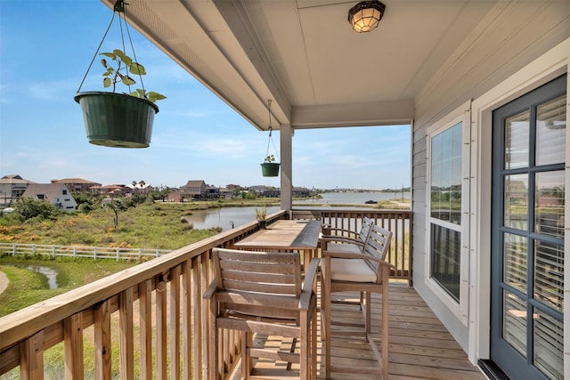 2101 Menard Ave, Seabrook, TX 77586 - wooden terrace with a water view
