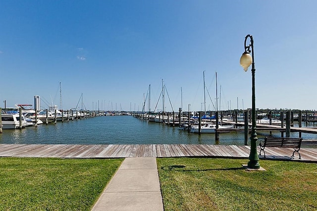 2619 Sailboat Dr, Houston, TX 77058 - dock with a lawn, a water view, and view of marina