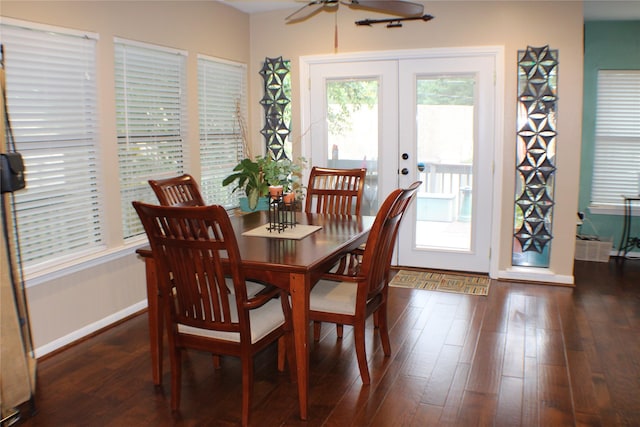 2619 Sailboat Dr, Houston, TX 77058 - dining area featuring a ceiling fan, french doors, dark wood-type flooring, and baseboards