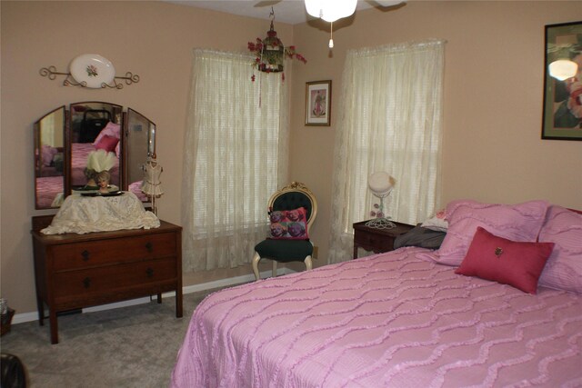 2619 Sailboat Dr, Houston, TX 77058 - carpeted bedroom with ceiling fan and baseboards