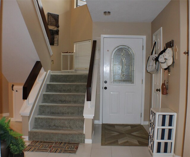 2619 Sailboat Dr, Houston, TX 77058 - tiled entrance foyer with stairway and baseboards