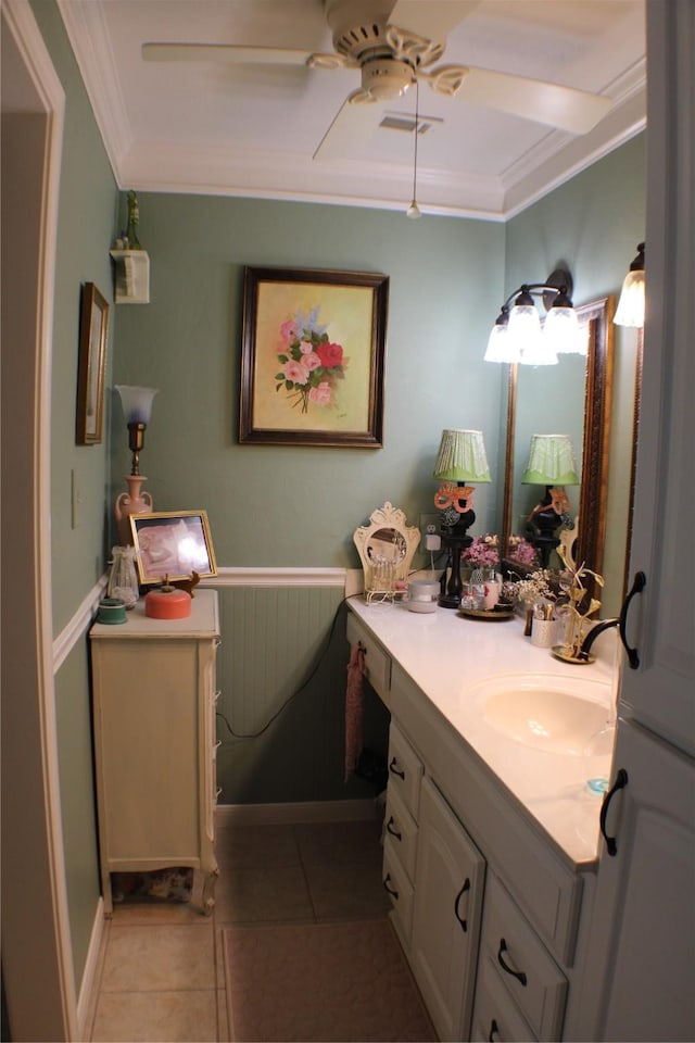 2619 Sailboat Dr, Houston, TX 77058 - bathroom featuring ornamental molding, tile patterned flooring, vanity, ceiling fan, and baseboards