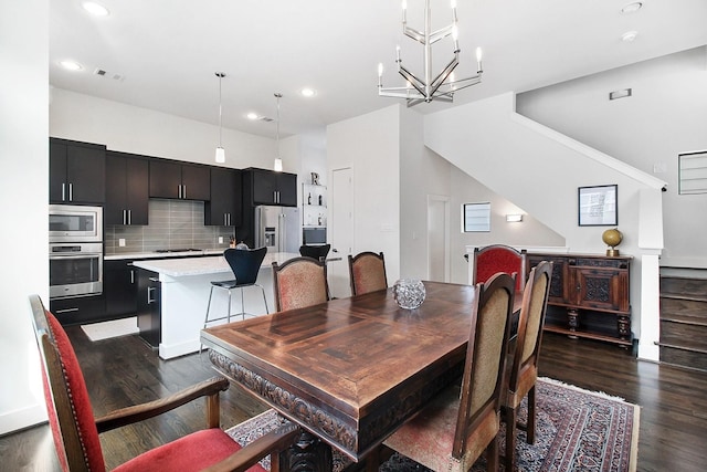2205 Colorado St, Houston, TX 77007 - dining area featuring recessed lighting, a chandelier, dark wood finished floors, and stairs