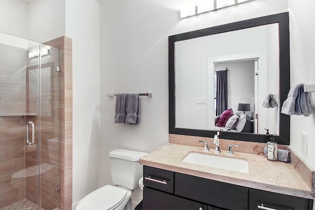 2205 Colorado St, Houston, TX 77007 - bathroom featuring vanity, a stall shower, and toilet
