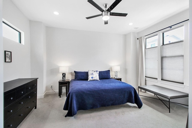 2205 Colorado St, Houston, TX 77007 - bedroom featuring light carpet, multiple windows, baseboards, recessed lighting, and a ceiling fan