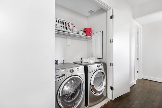 2205 Colorado St, Houston, TX 77007 - washroom featuring washer and clothes dryer and dark wood finished floors