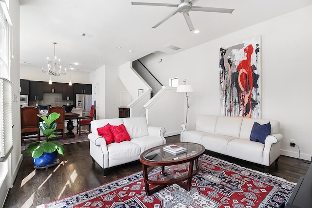 2205 Colorado St, Houston, TX 77007 - living room with dark wood-type flooring, a chandelier, ceiling fan, recessed lighting, and stairs