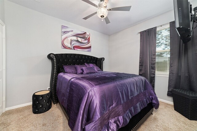 29122 Artic Brook Ln, Fulshear, TX 77441 - carpeted bedroom with baseboards and a ceiling fan