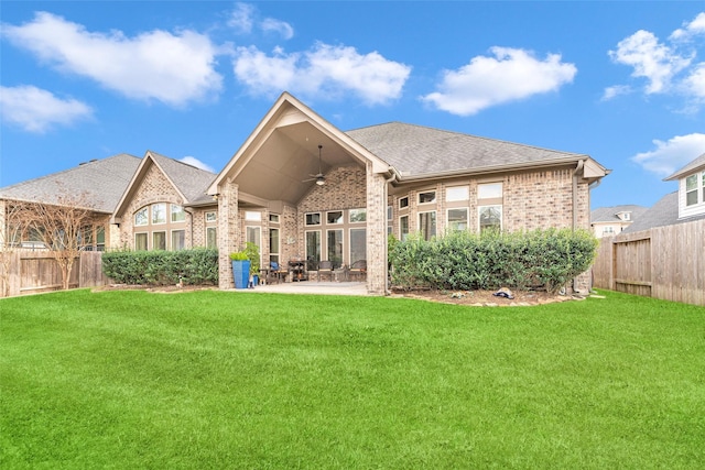 222 Reynosa Ct, Pinehurst, TX 77362 - rear view of property featuring brick siding, ceiling fan, a patio area, and roof with shingles