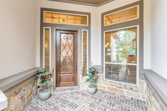 222 Reynosa Ct, Pinehurst, TX 77362 - property entrance featuring stucco siding and covered porch