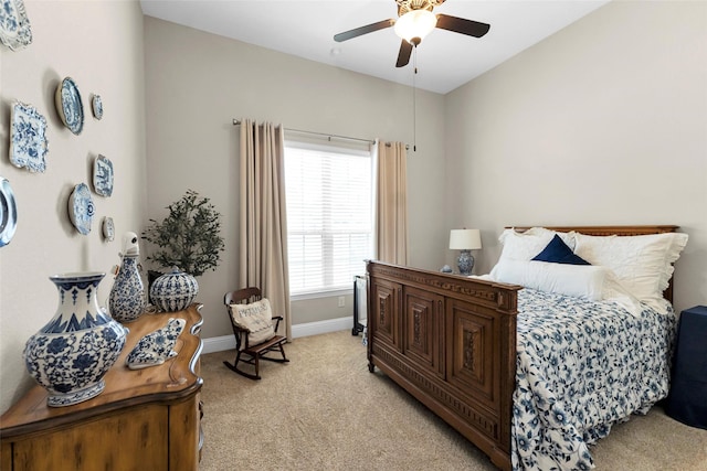222 Reynosa Ct, Pinehurst, TX 77362 - bedroom featuring light carpet, baseboards, and ceiling fan