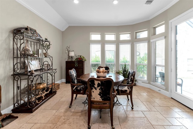 222 Reynosa Ct, Pinehurst, TX 77362 - dining space with stone tile flooring, ornamental molding, plenty of natural light, baseboards, and recessed lighting