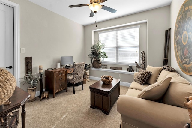 222 Reynosa Ct, Pinehurst, TX 77362 - office area featuring light colored carpet, ceiling fan, and baseboards