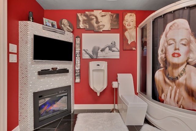 6206 Bayou Blvd, Baytown, TX 77521 - interior space with a glass covered fireplace