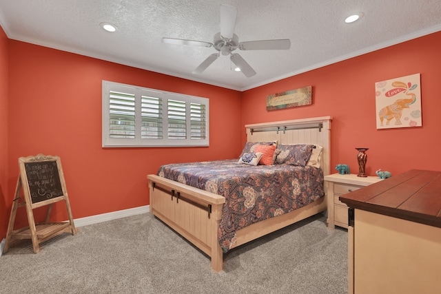 6206 Bayou Blvd, Baytown, TX 77521 - carpeted bedroom featuring crown molding, a textured ceiling, recessed lighting, a ceiling fan, and baseboards