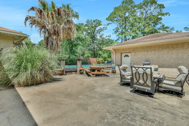 6206 Bayou Blvd, Baytown, TX 77521 - view of patio / terrace featuring outdoor dining space and fence