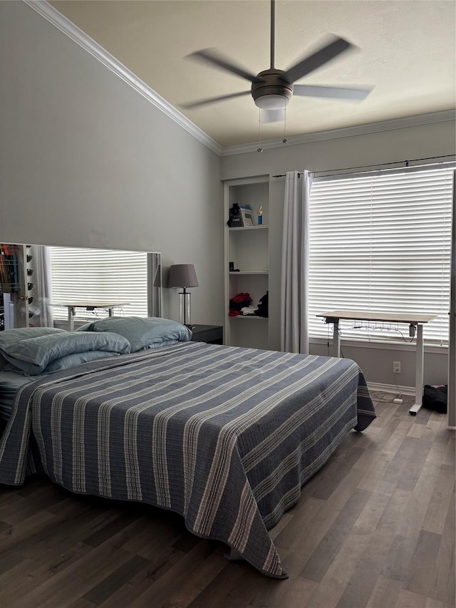 2111 Welch St Unit A307, Houston, TX 77019 - bedroom featuring crown molding, dark wood finished floors, baseboards, a ceiling fan, and multiple windows