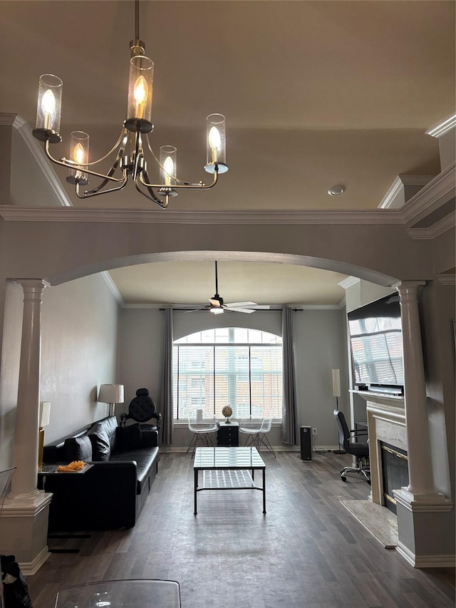 2111 Welch St Unit A307, Houston, TX 77019 - living area with arched walkways, decorative columns, wood finished floors, ceiling fan, and ornamental molding