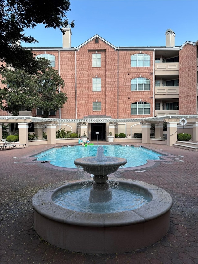 2111 Welch St Unit A307, Houston, TX 77019 - view of community featuring a pool