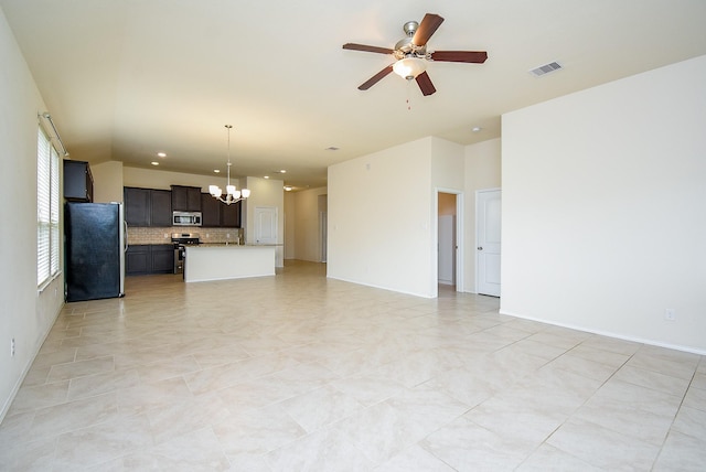 4622 Stolz Trl, Katy, TX 77493 - unfurnished living room with a chandelier, a ceiling fan, recessed lighting, and baseboards