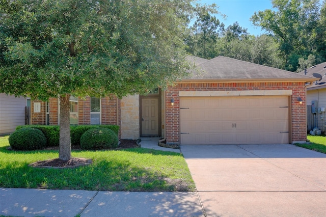 9533 E Woodmark, Conroe, TX 77304 - view of front of home with driveway, brick siding, an attached garage, a shingled roof, and a front yard