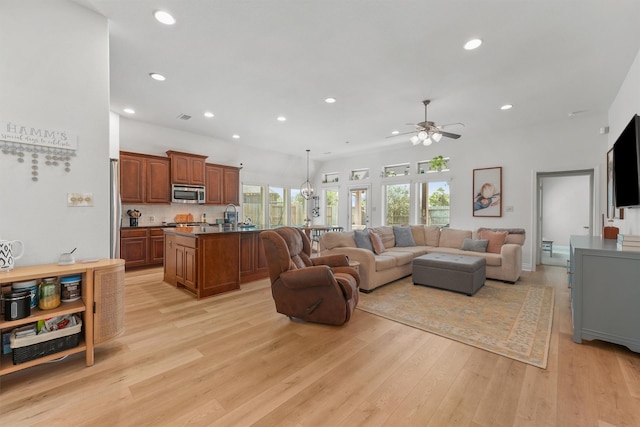 28803 Crested Butte Dr, Katy, TX 77494 - living room featuring recessed lighting, light wood-type flooring, and a ceiling fan