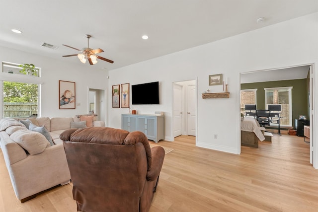 28803 Crested Butte Dr, Katy, TX 77494 - living area with light wood-style flooring, ceiling fan, recessed lighting, and baseboards