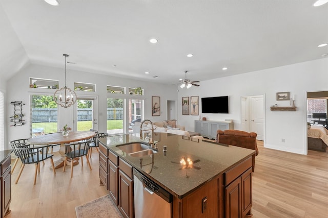 28803 Crested Butte Dr, Katy, TX 77494 - kitchen with dishwasher, brown cabinets, a sink, light wood finished floors, and recessed lighting