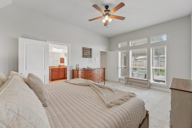 28803 Crested Butte Dr, Katy, TX 77494 - bedroom with light colored carpet, ensuite bath, a ceiling fan, and a sink