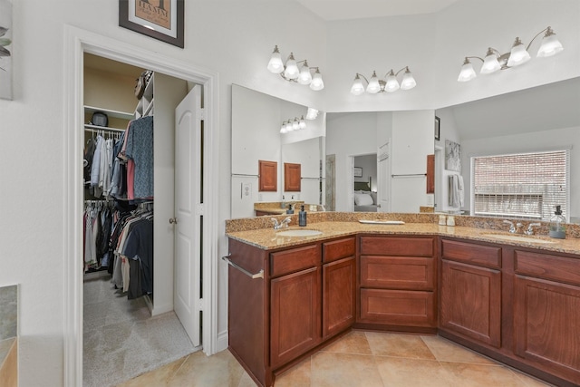 28803 Crested Butte Dr, Katy, TX 77494 - full bath with double vanity, tile patterned flooring, and a spacious closet