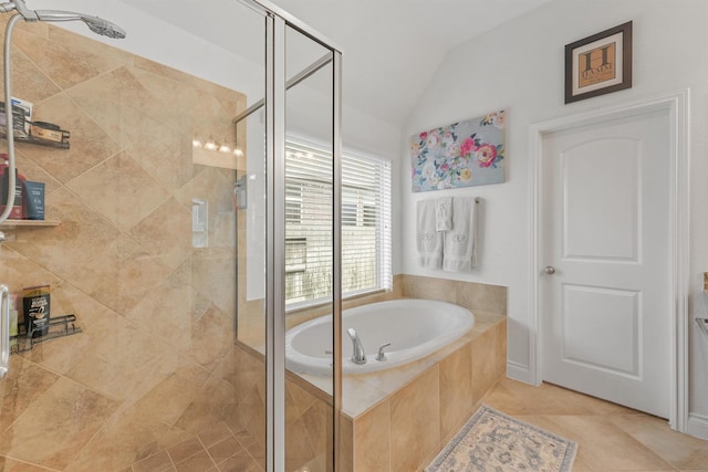 28803 Crested Butte Dr, Katy, TX 77494 - full bathroom featuring a garden tub, a shower stall, lofted ceiling, and tile patterned flooring