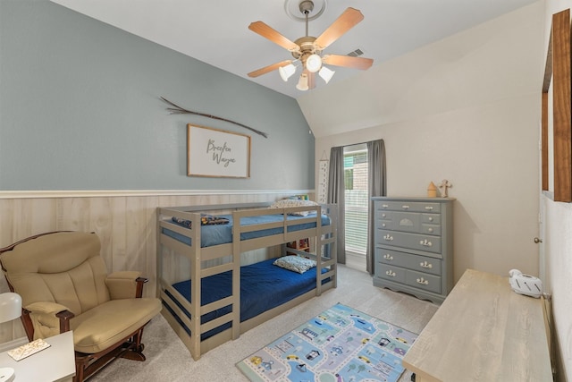 28803 Crested Butte Dr, Katy, TX 77494 - bedroom featuring carpet flooring, lofted ceiling, ceiling fan, and a wainscoted wall