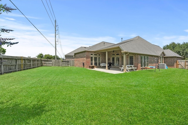 28803 Crested Butte Dr, Katy, TX 77494 - rear view of property with brick siding, a patio, ceiling fan, and a shingled roof