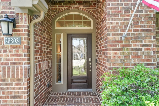 28803 Crested Butte Dr, Katy, TX 77494 - doorway to property featuring brick siding