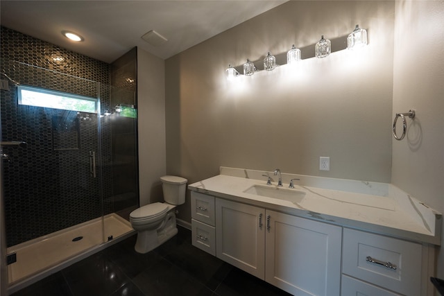 full bath featuring toilet, a stall shower, vanity, and tile patterned flooring