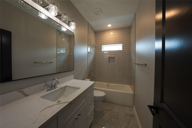 full bath featuring marble finish floors, toilet, baseboards, vanity, and bathing tub / shower combination