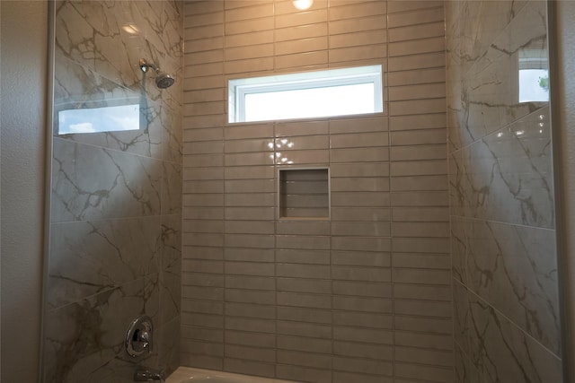 full bath featuring  shower combination