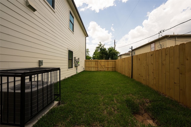 view of yard featuring central AC