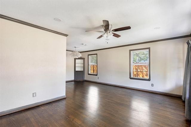 1741 Gardenia Dr, Houston, TX 77018 - spare room with crown molding, dark wood-style floors, a ceiling fan, baseboards, and a chandelier