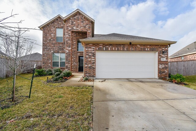 7303 Dover View Ln, Katy, TX 77493 - traditional home featuring brick siding, driveway, an attached garage, and a shingled roof