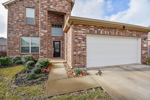 7303 Dover View Ln, Katy, TX 77493 - view of front of home with brick siding, concrete driveway, and a garage